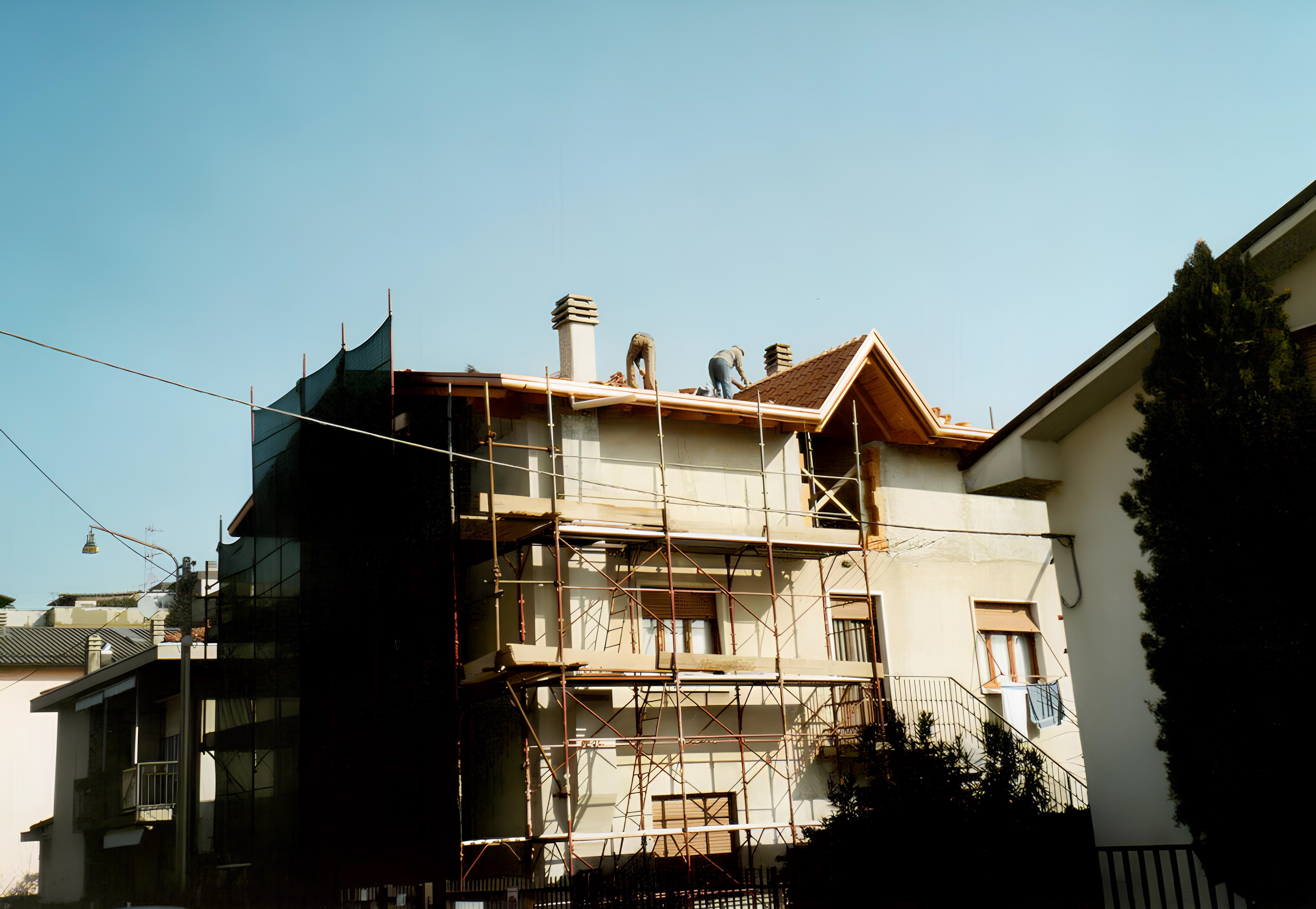 Ristrutturazione e Sopralzo Casa Bifamiliare